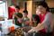 Mother Bakes with Children
